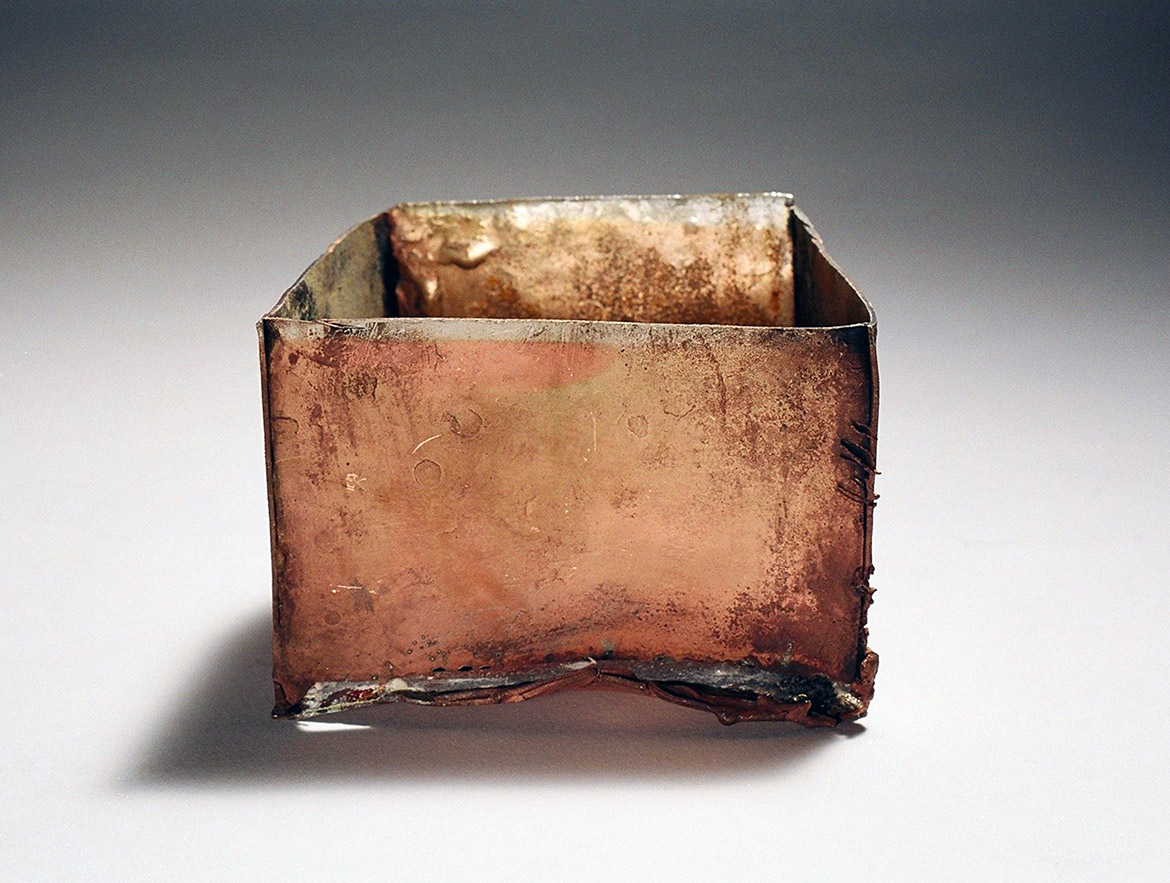 A fine silver and vitreous enamel square vessel