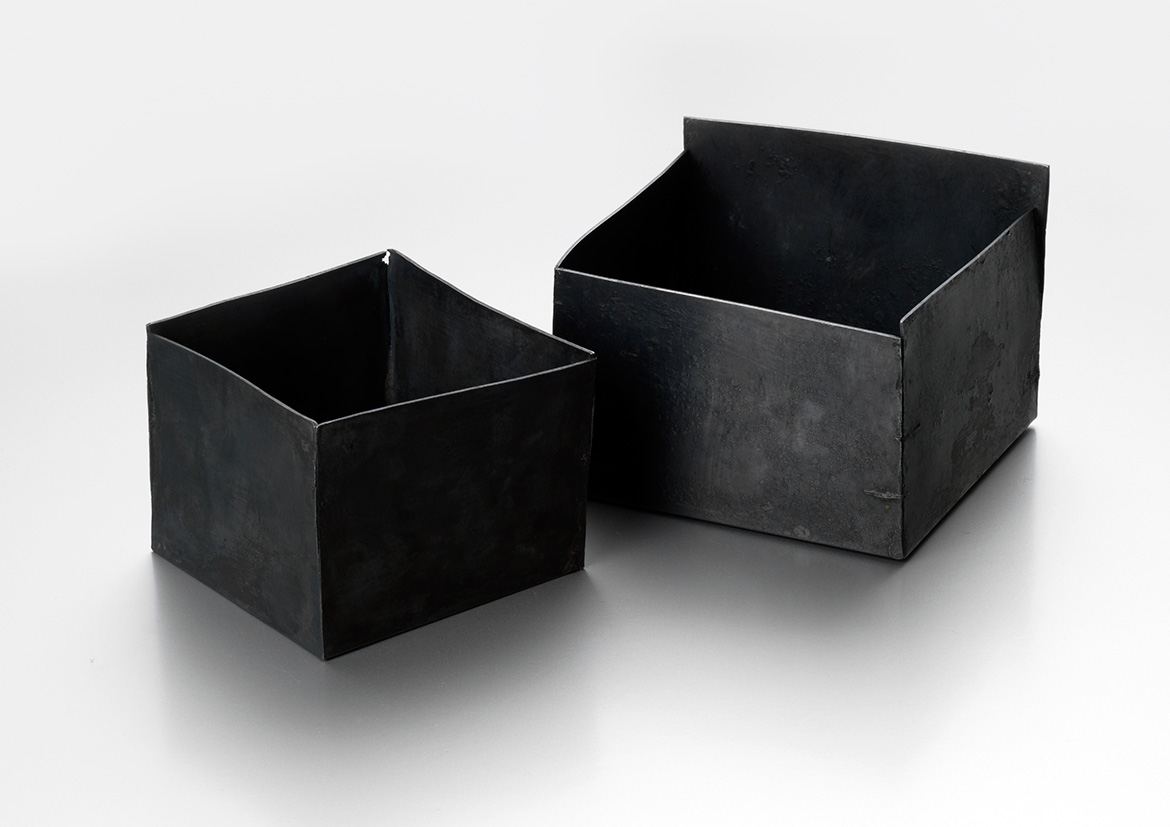 A set of two square vessels in patinated fine silver